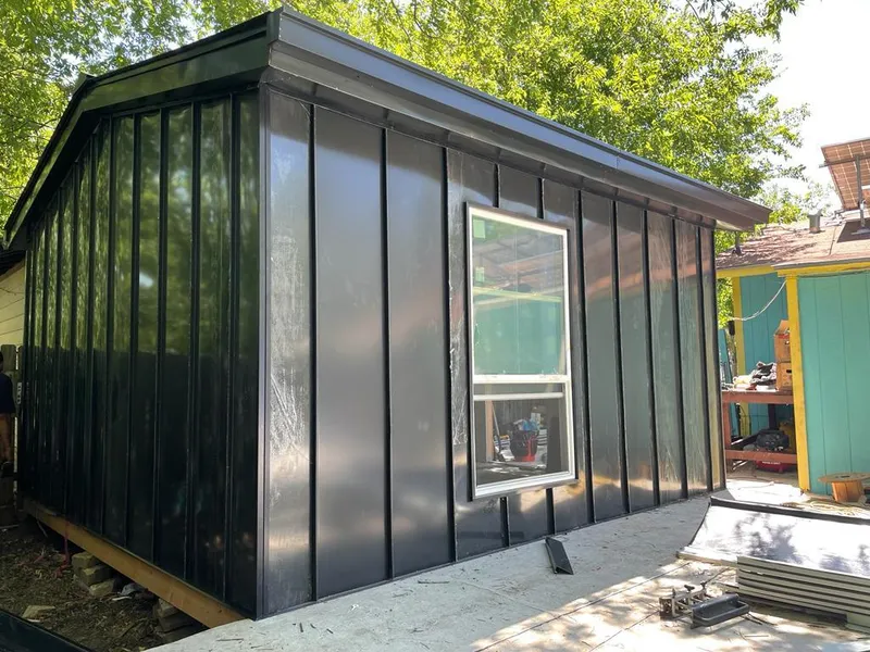 Black standing seam metal wall panels for Roof Inspection in Washington